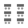 Two columns of tables in rows with chairs on one side, facing front.