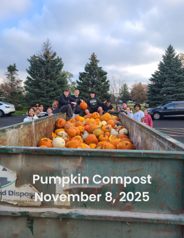 pumpkins in dumpster